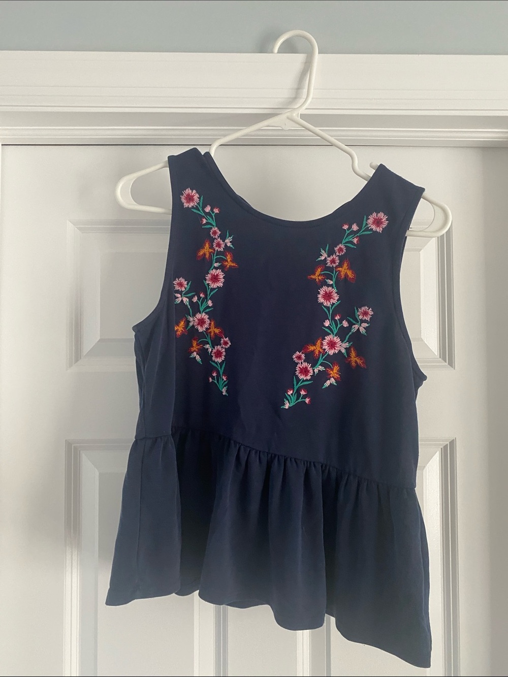 Navy Sleeveless Embroidered Peplum Tank Top